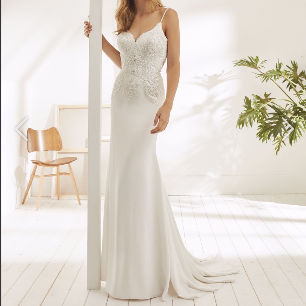 White One by Pronovias in the Style “Oakes” Fit and Flare Wedding Gown